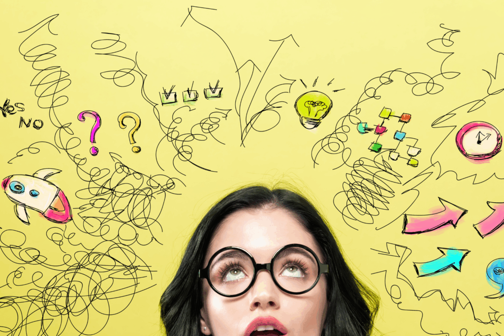 managing your negative thoughts is hard - this image shows a lady with all her thoughts circling her head